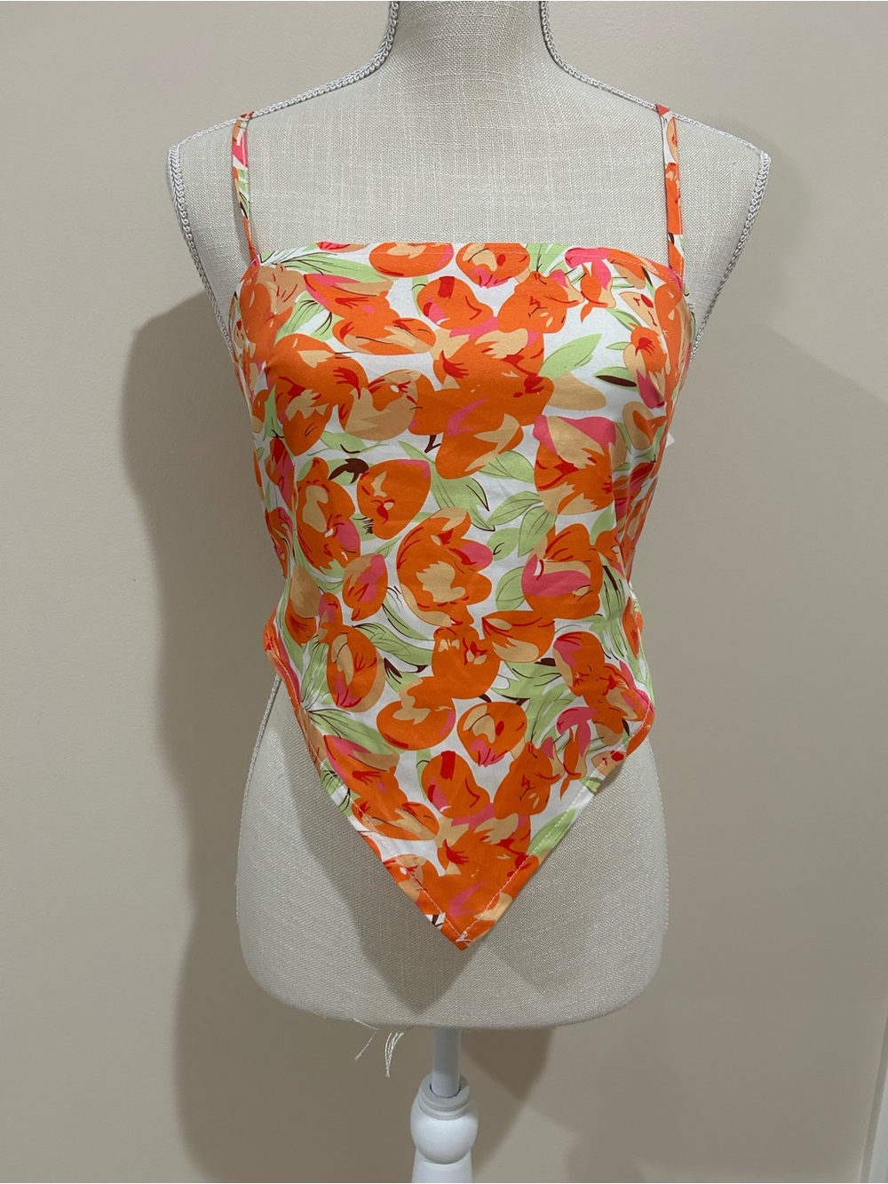 Cider Orange Floral Handkerchief-Hem Bodysuit